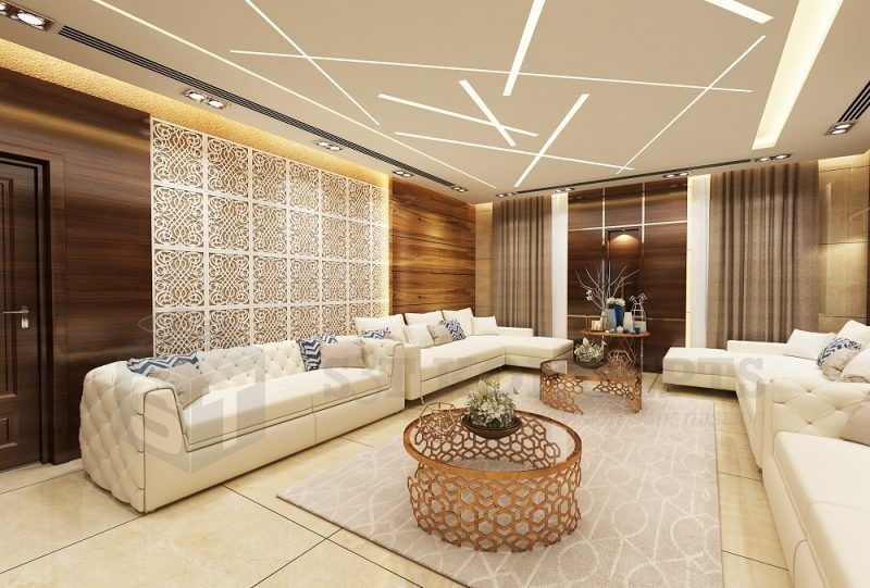 Luxury living room with custom white sofas, decorative wall panels, and modern ceiling lighting.